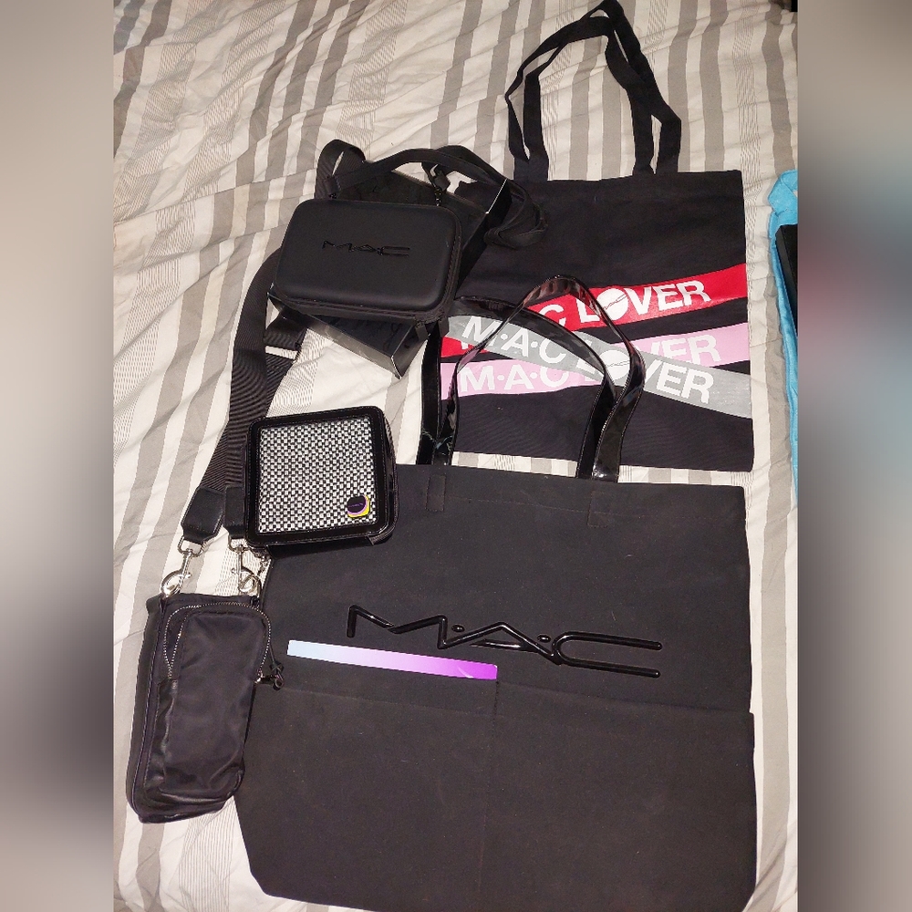 4 Mac cosmetics bags and 1 Walmart water bottle purse.(on the left)